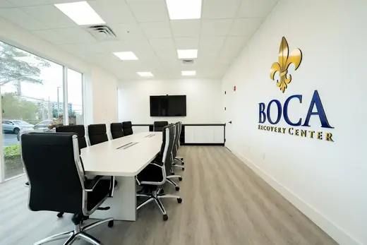 Bright conference room with modern chairs at Boca Recovery Center, a detox center in Miami.