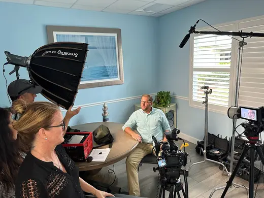 Professional filming setup in a bright room at Coastal Detox, a detox center in Miami.