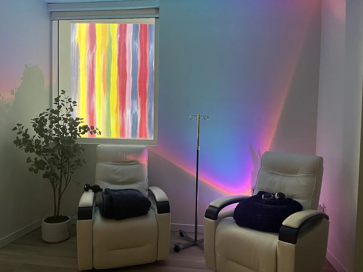 Relaxing treatment room with colorful lighting at Infinity Medical Wellness, a treatment center in Miami.